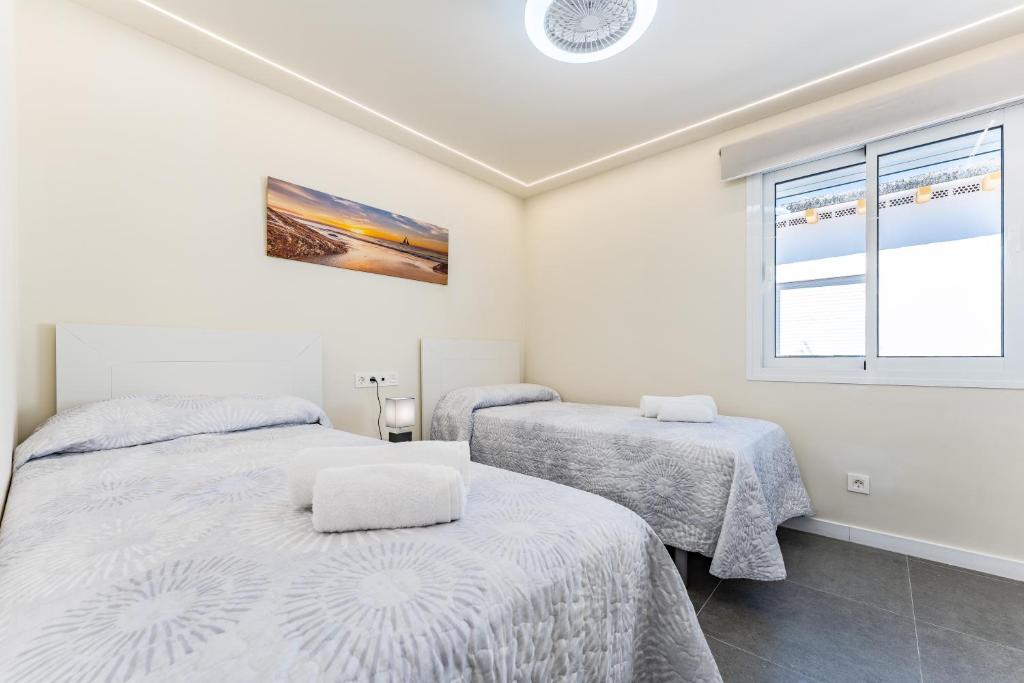 mijas-beach-house-dormitorio-camas-individuales-01